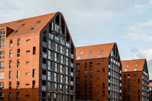 a group of buildings with a sky background