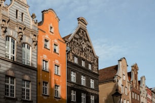 a group of buildings with a sky background