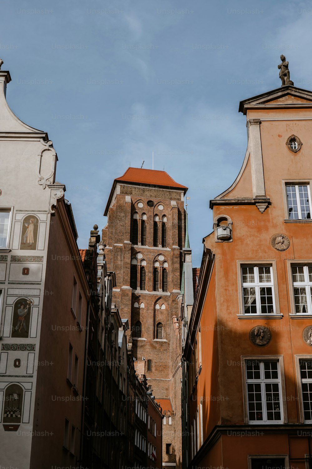 a tall building with a clock on it's side