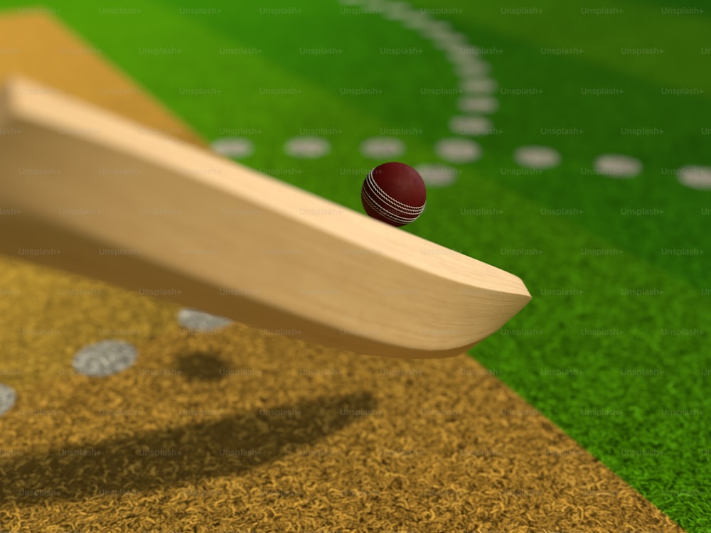 um taco de beisebol batendo uma bola em um campo de beisebol