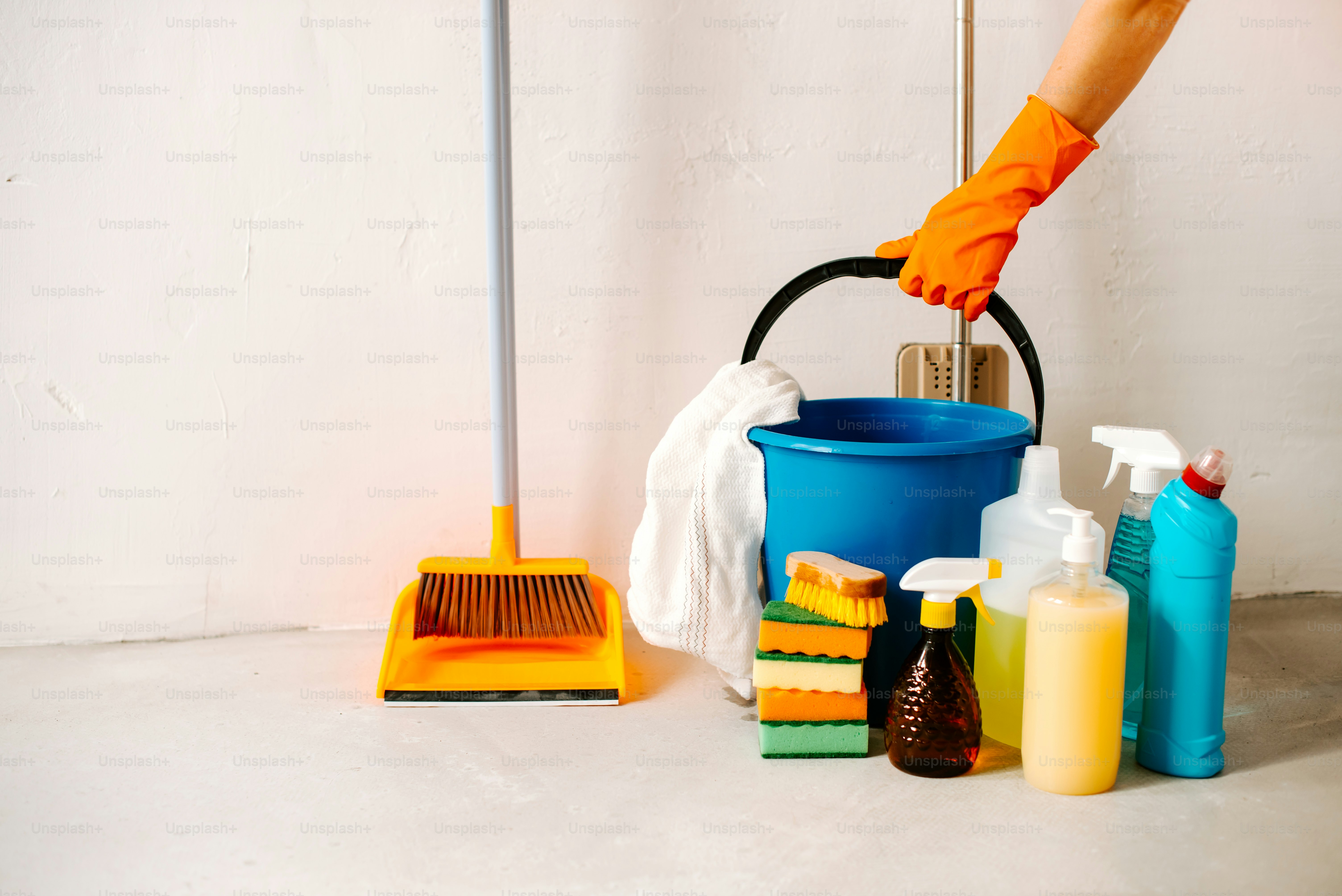 a person is cleaning the floor with a mop