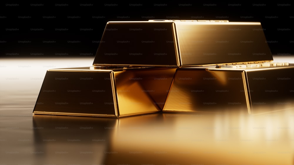 Un gruppo di cubi d'oro seduti in cima a un tavolo