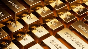 un groupe de lingots d’or empilés les uns sur les autres