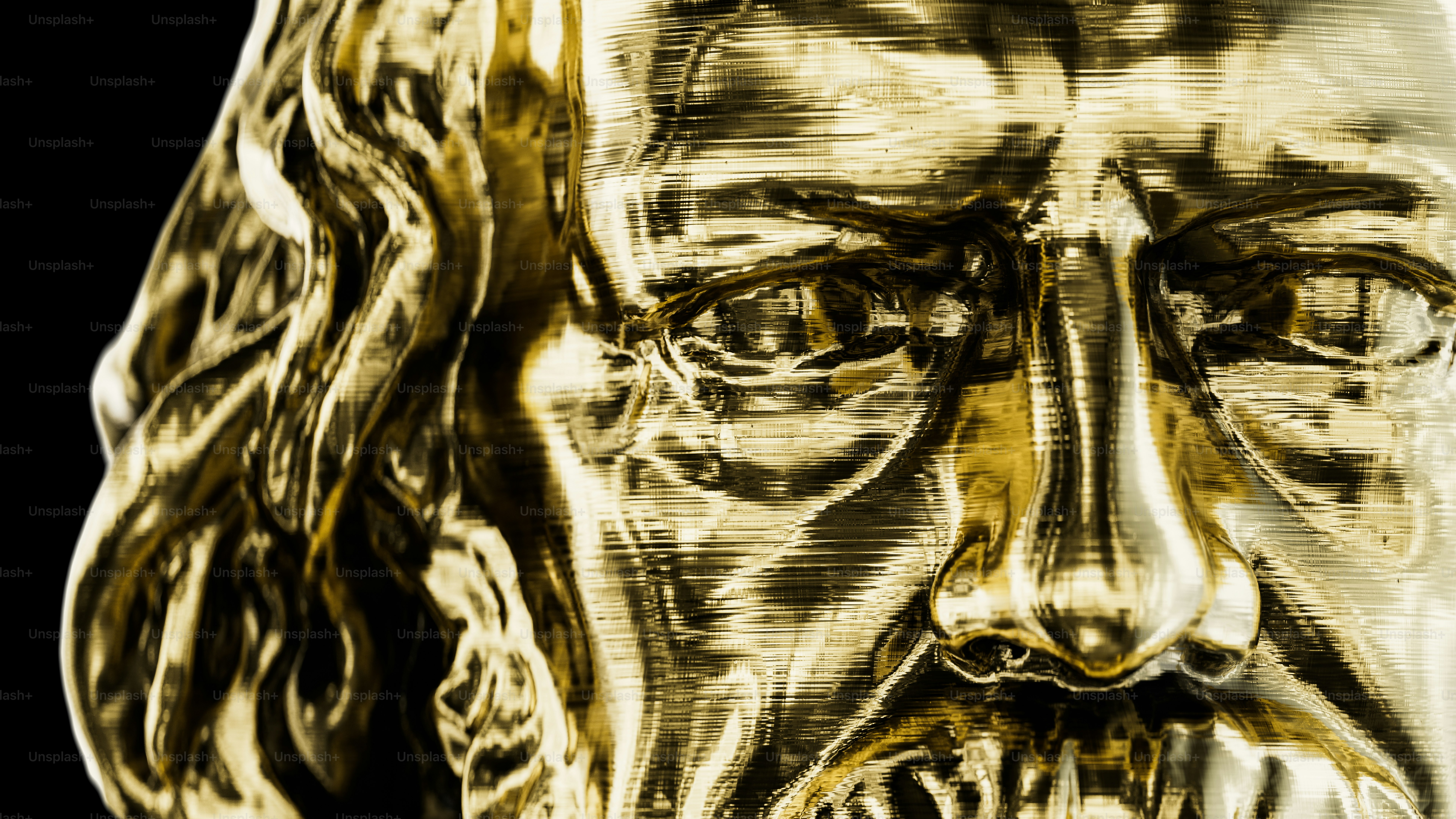 a close up of a statue of a man's face