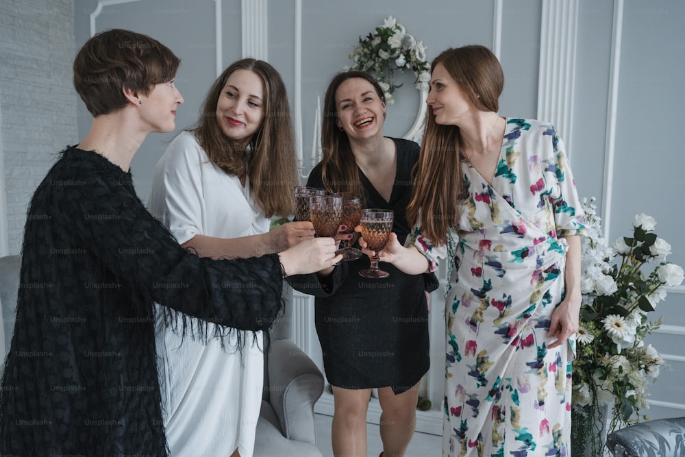 a group of women standing next to each other