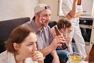 a group of people sitting around a table