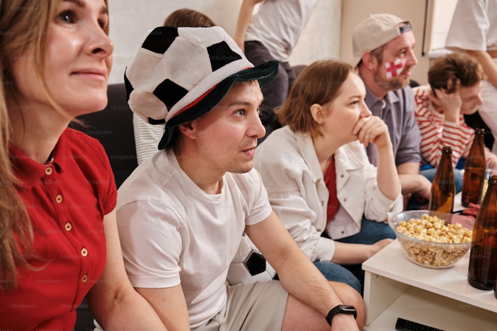 a group of people sitting next to each other