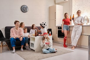 a group of people that are sitting on a couch