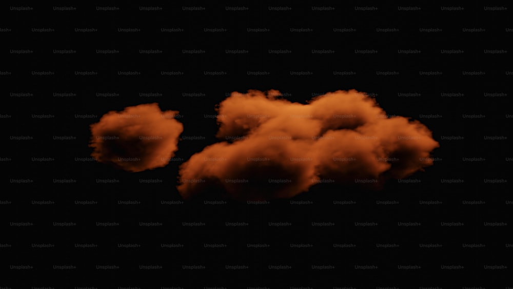a group of orange clouds floating in the dark sky
