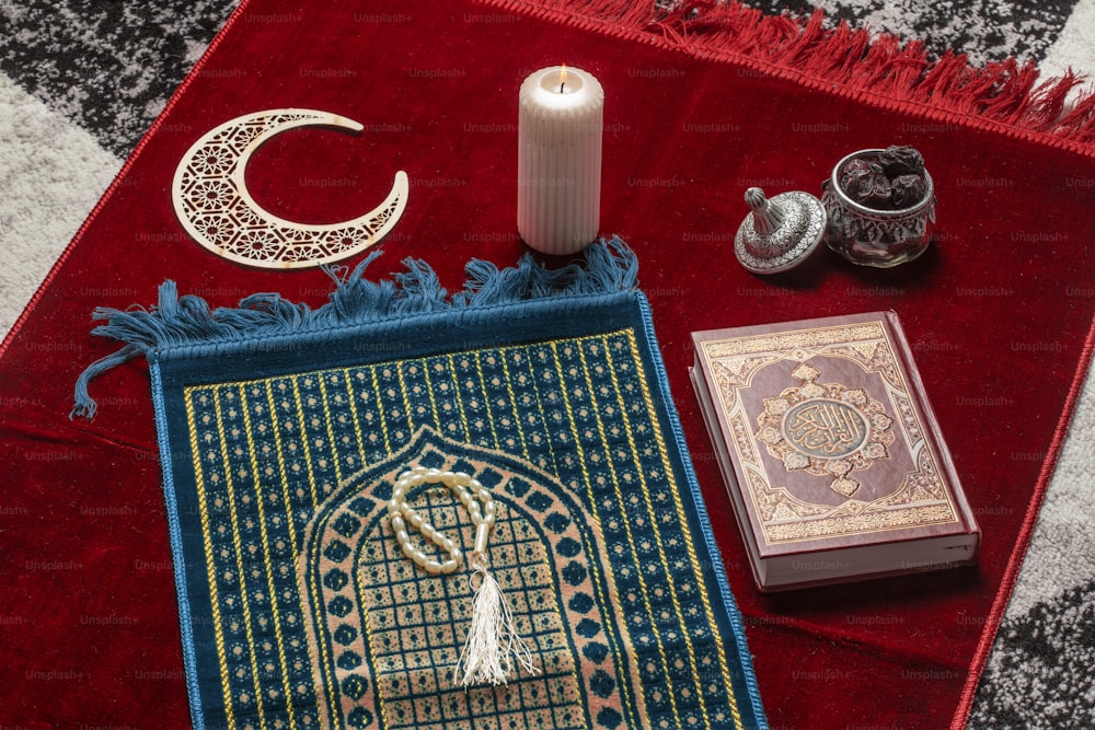 a rug, candle, and other items on a table