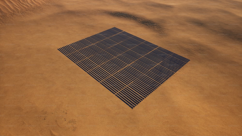 Una foto de un panel solar en la arena