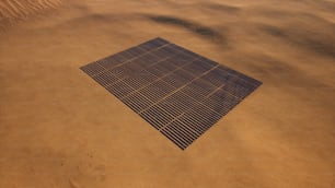 a photo of a solar panel in the sand