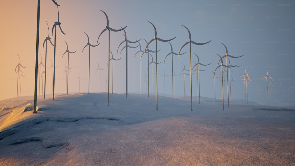 a row of wind mills on a snowy hill