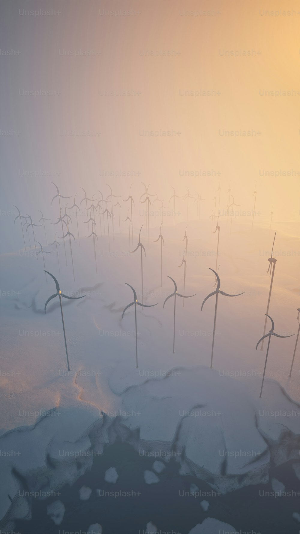 a large group of wind mills in the snow