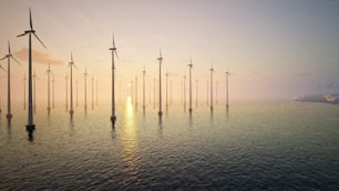 a group of windmills floating on top of a body of water