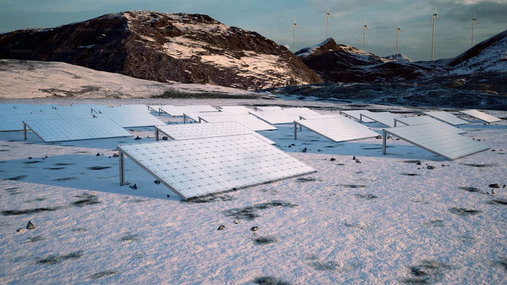 a bunch of solar panels in the snow