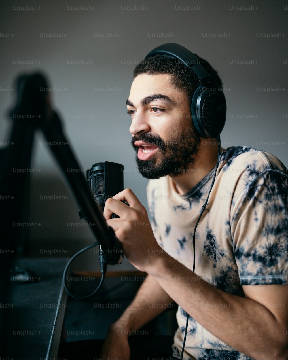 a man with headphones and a microphone