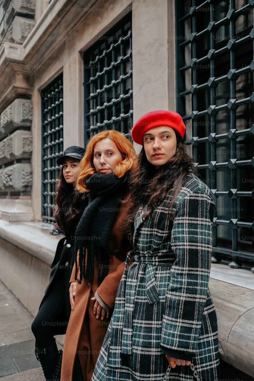 a group of women standing next to each other