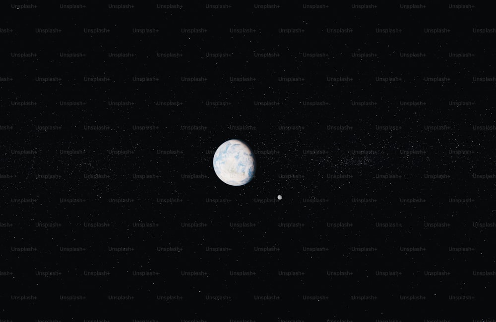 dois planetas são vistos no céu escuro