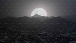 uma lua cheia nascendo sobre uma cordilheira