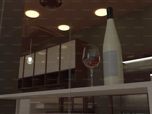 a glass of wine sitting on top of a counter