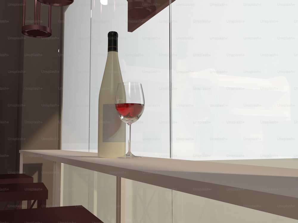 una bottiglia di vino e un bicchiere su un bancone