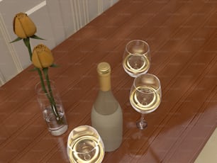 three glasses of wine and a bottle of wine on a table