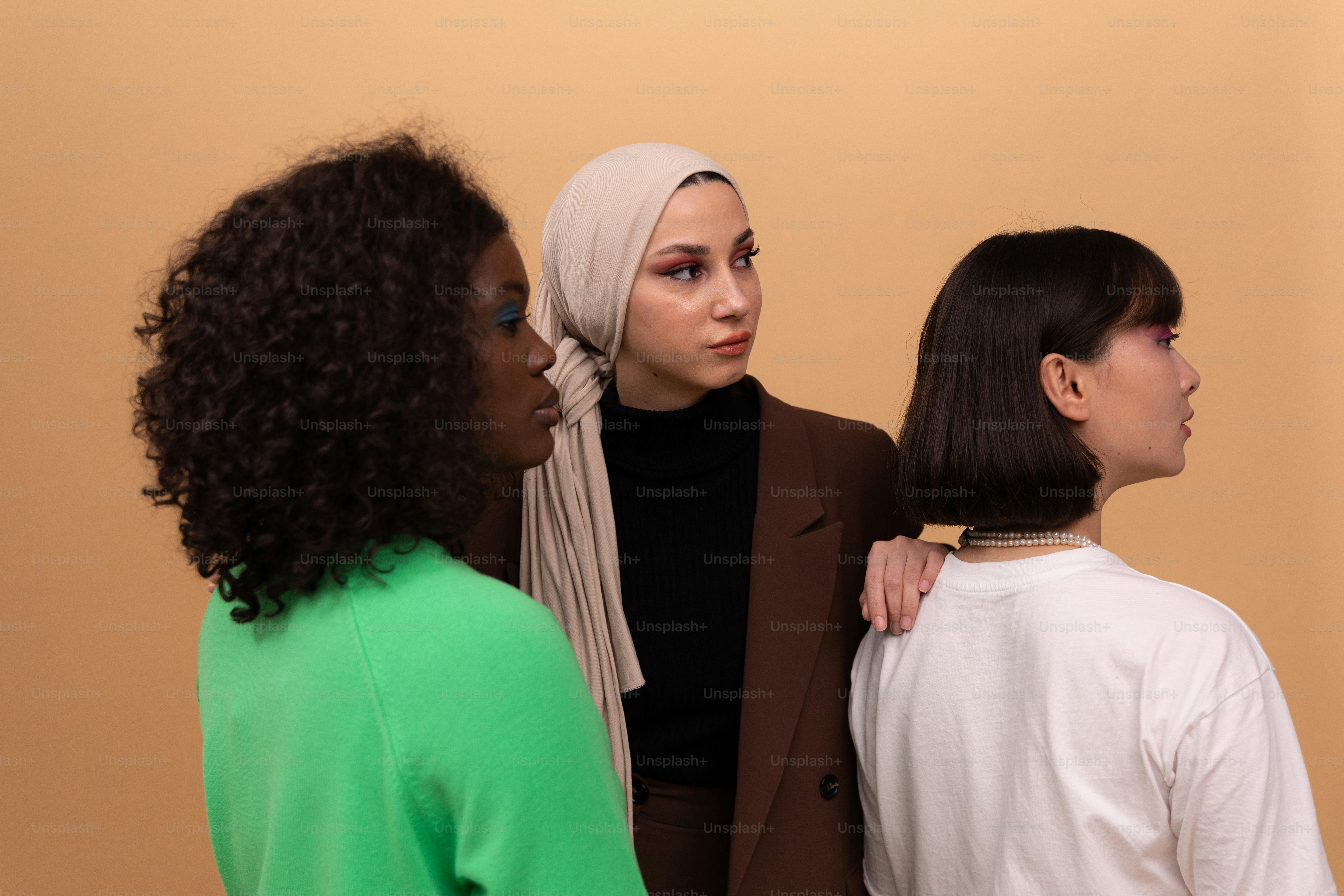 a group of women standing next to each other