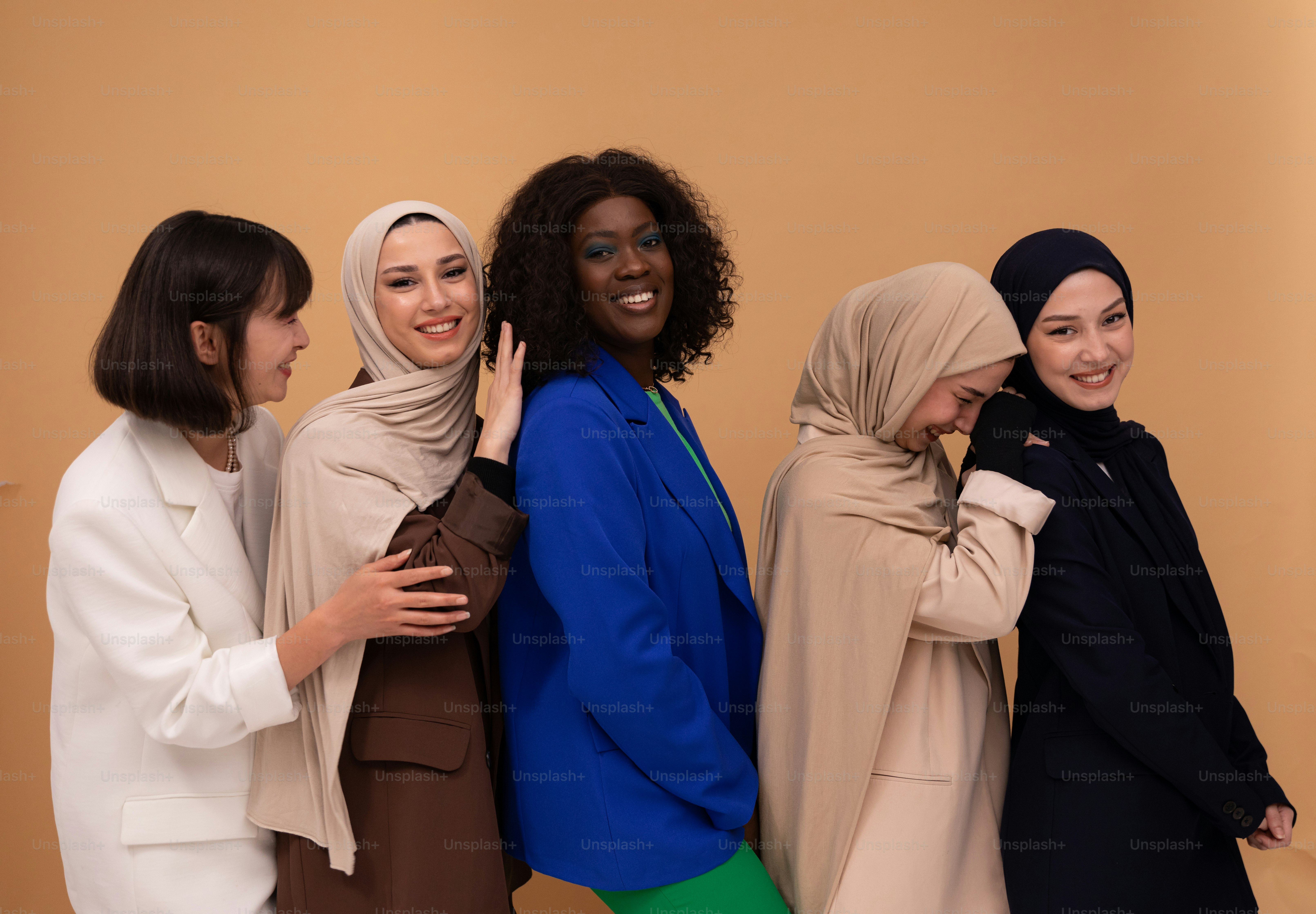 a group of women standing next to each other