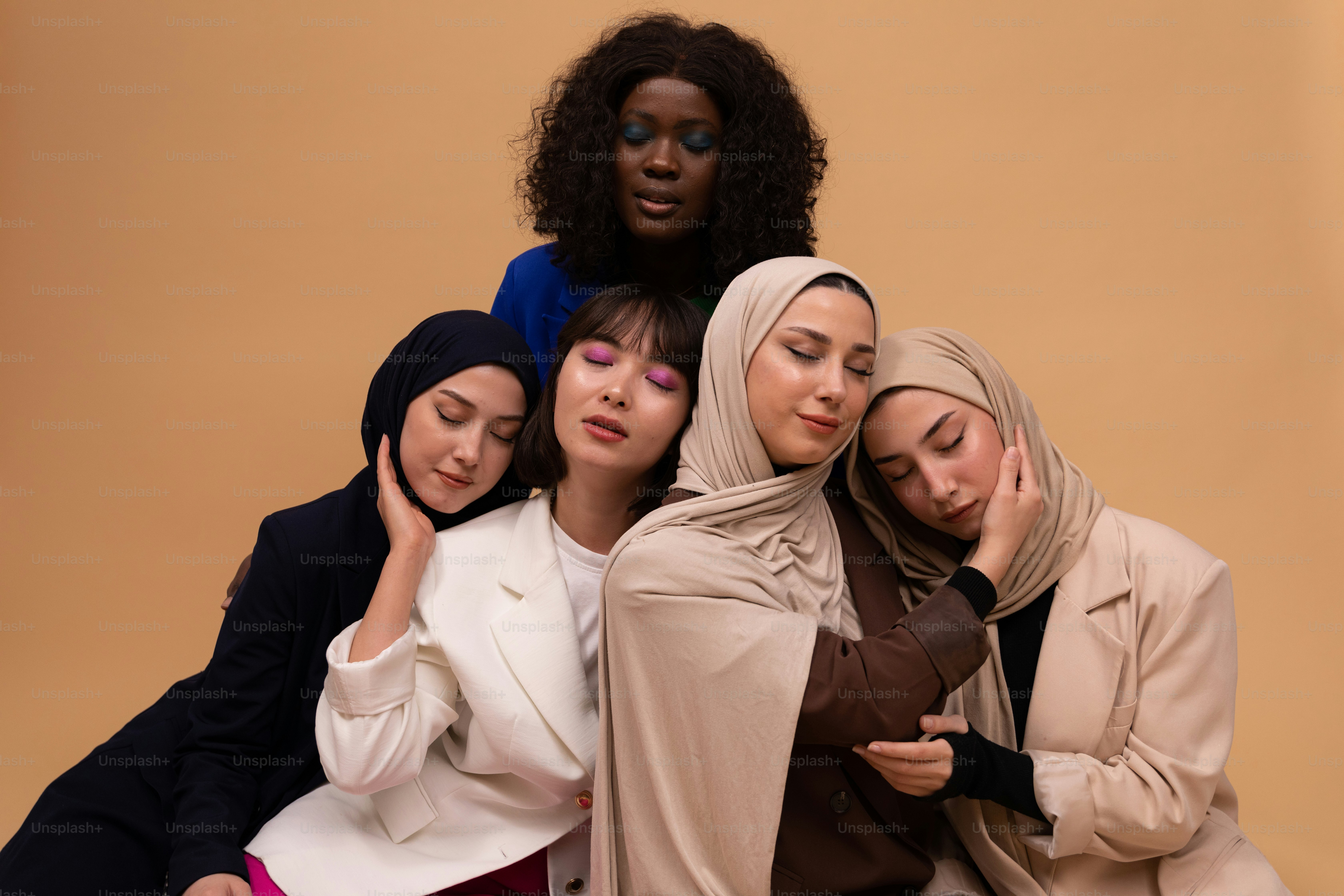 a group of women sitting next to each other