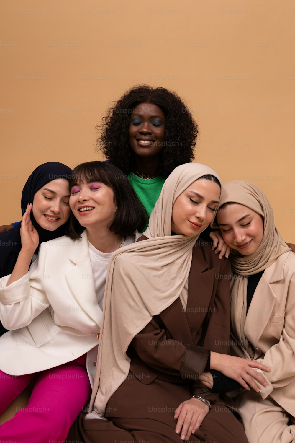 a group of women sitting next to each other