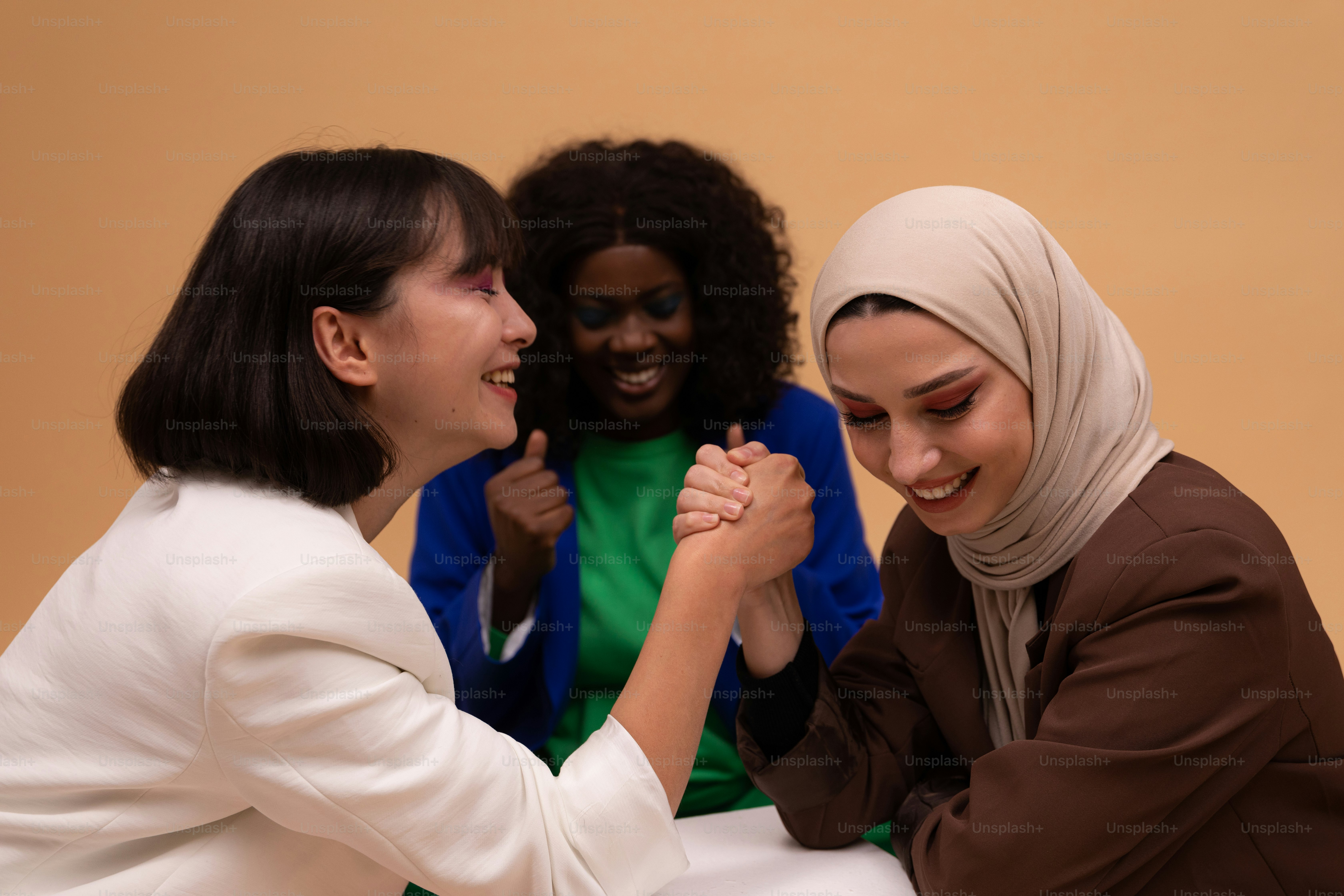 a group of women sitting next to each other