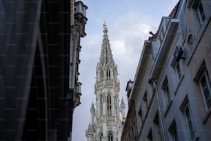 a tall building with a steeple in the background