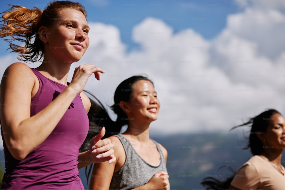 a group of women running in a line