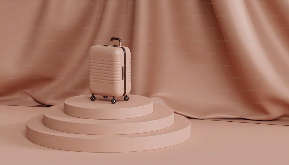 a suitcase sitting on a pedestal in front of a curtain