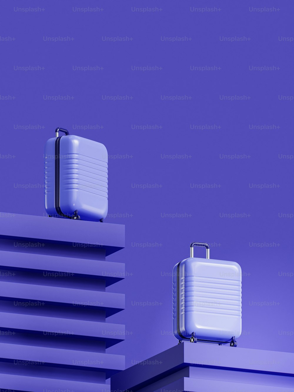 Dos piezas de equipaje sentadas en la parte superior de un edificio