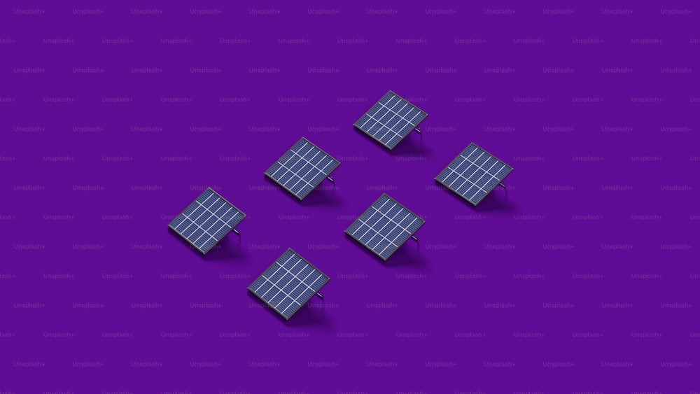 Eine Gruppe von vier Sonnenkollektoren, die auf einer violetten Oberfläche sitzen