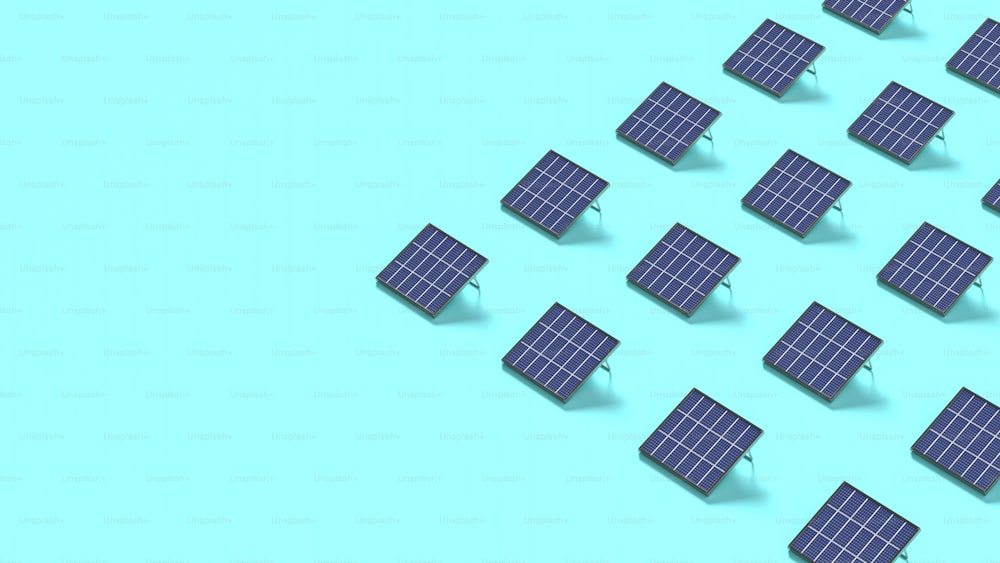 um grupo de pequenos painéis solares em um fundo azul