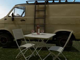 a table with two chairs next to a van