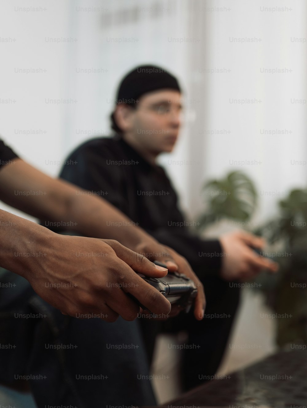 a man holding a remote control in his hand
