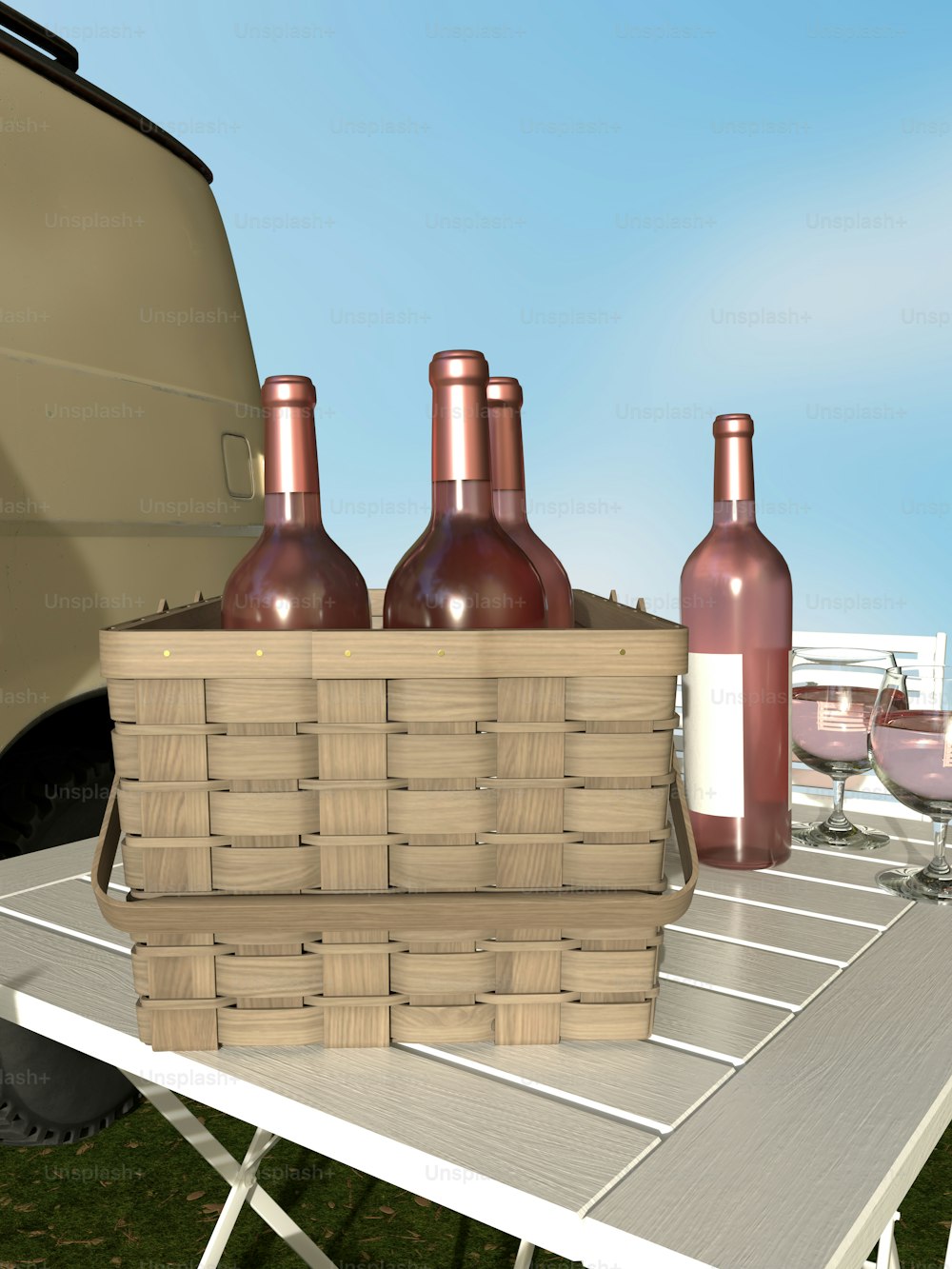 una mesa de picnic con botellas de vino y una cesta