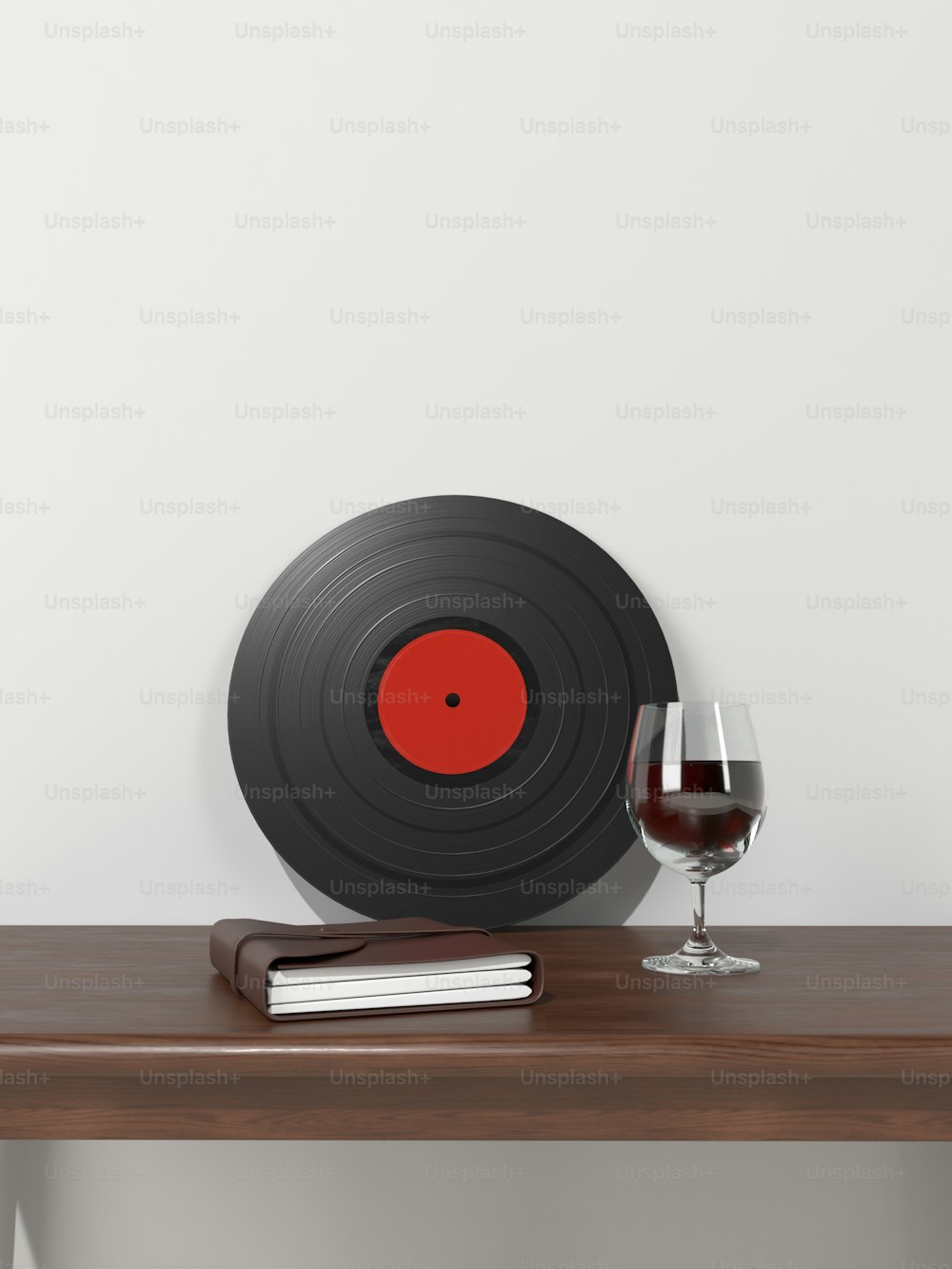グラスワインとテーブルの上のレコード