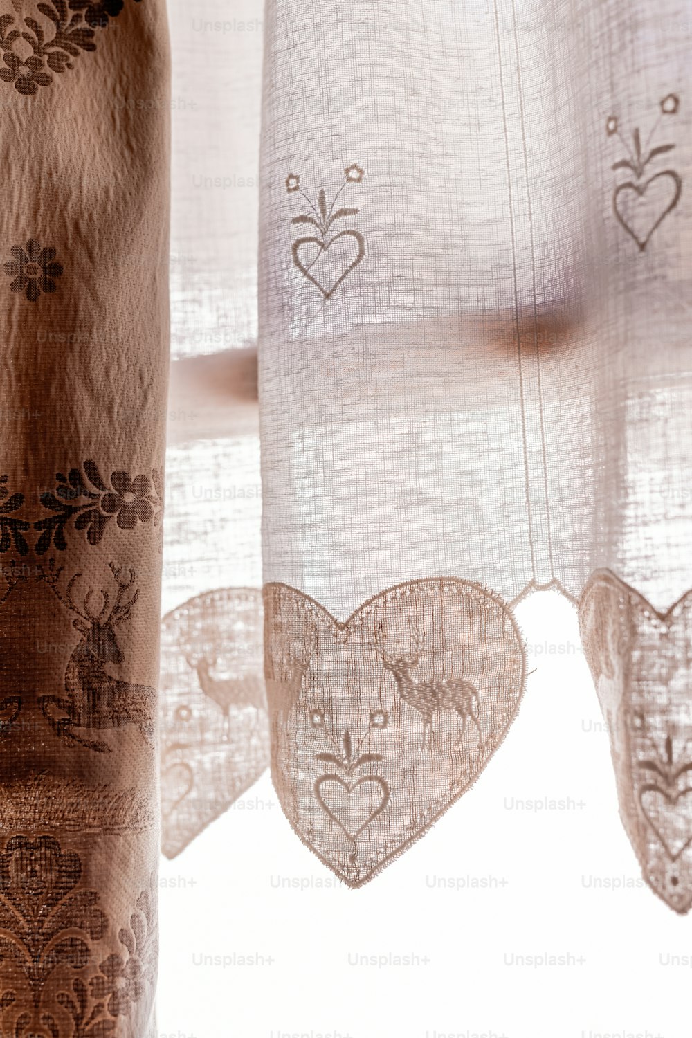 a curtain with a heart drawn on it