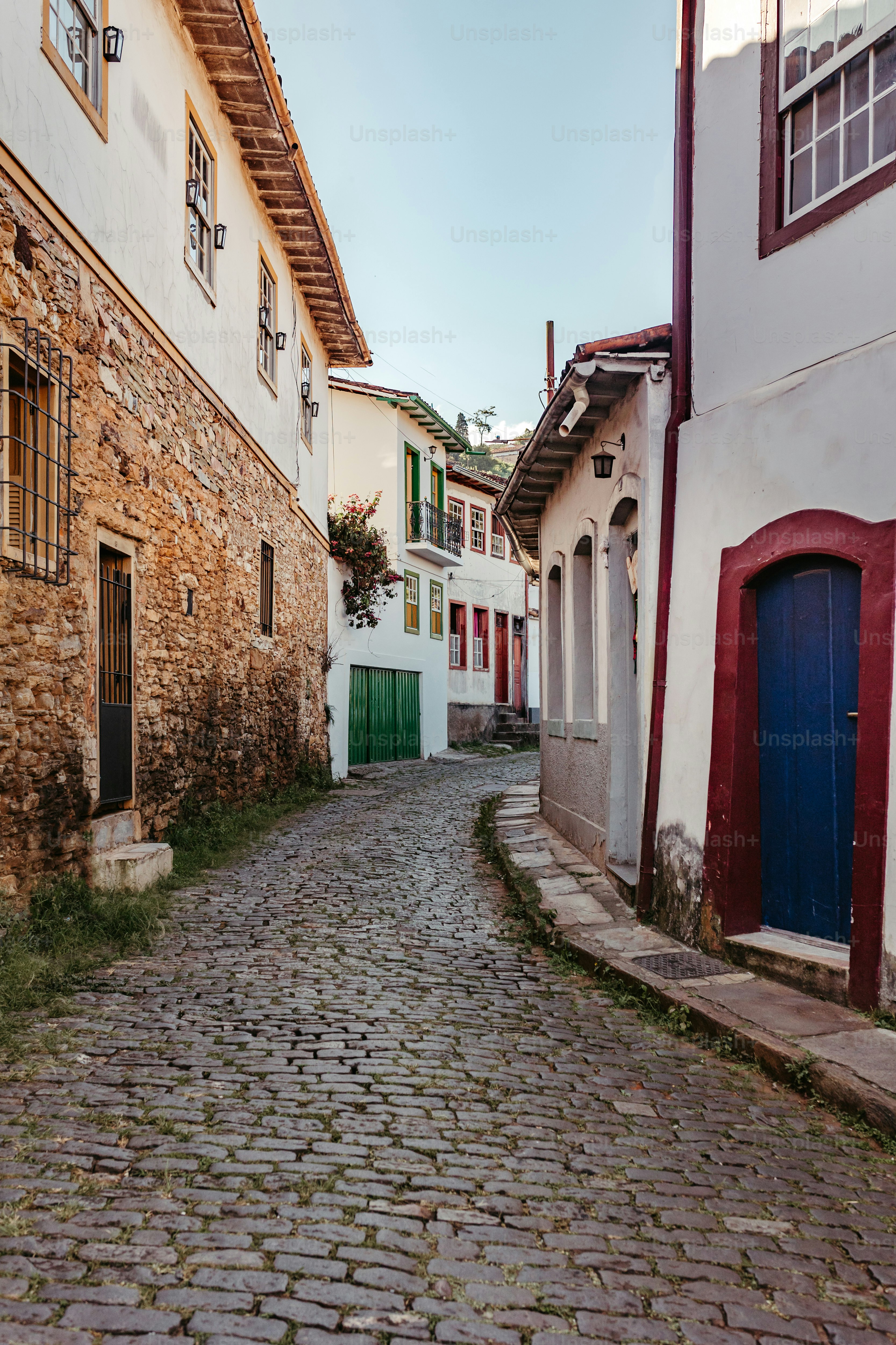 a cobblestone street in a small town