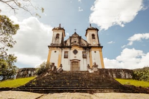 a church with a steeple and a clock tower