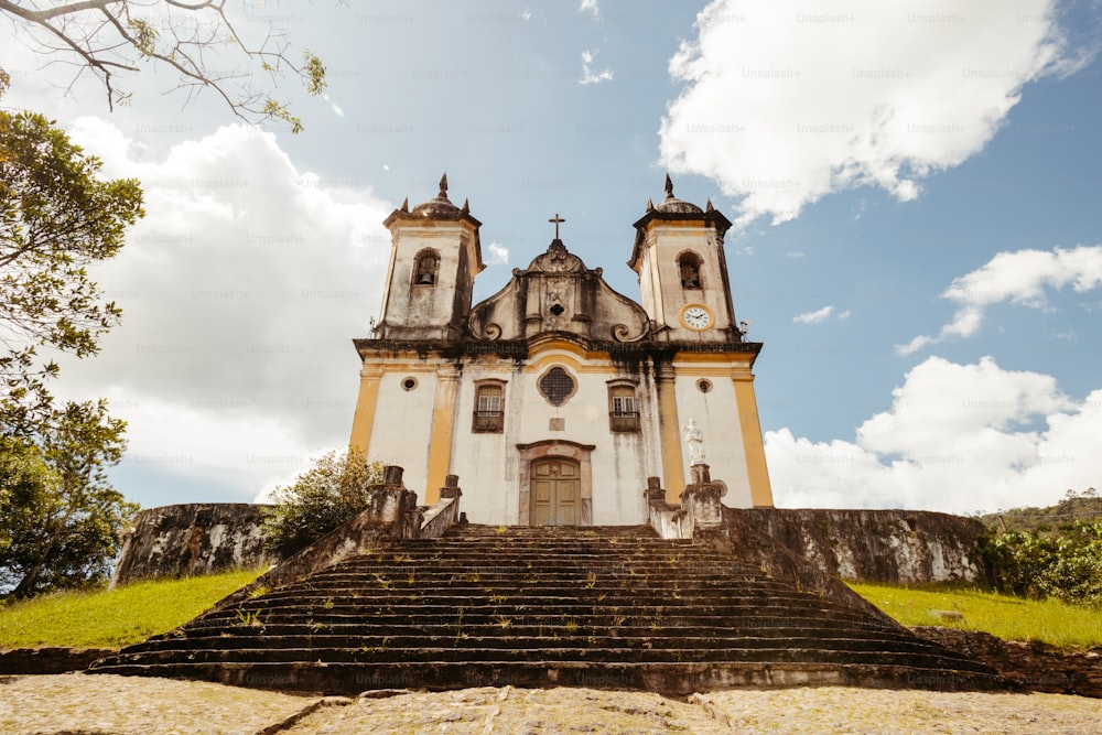 a church with a steeple and a clock tower