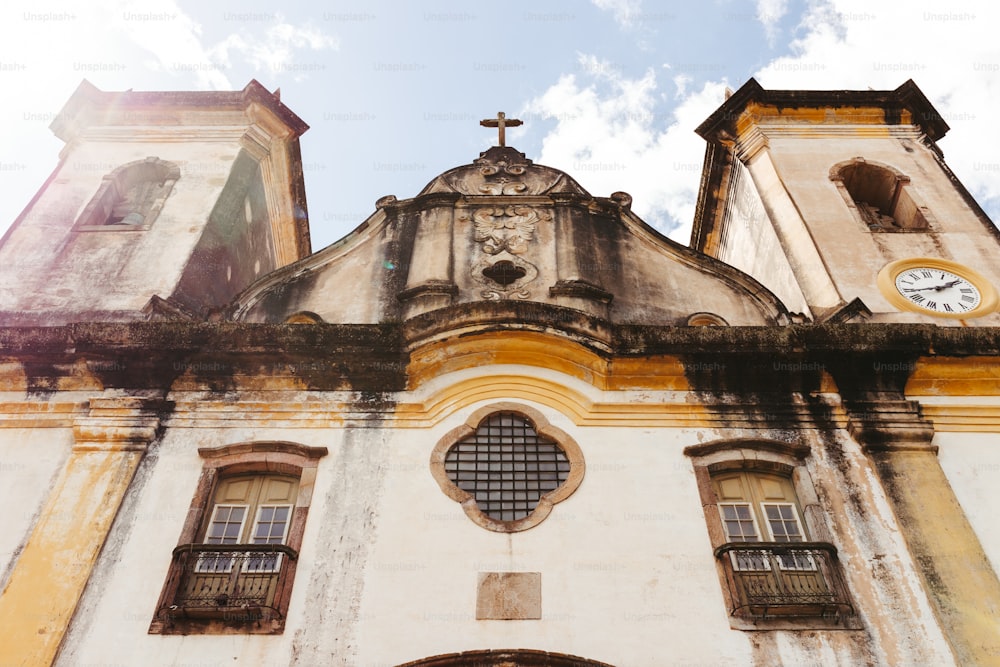 a church with a clock on the front of it