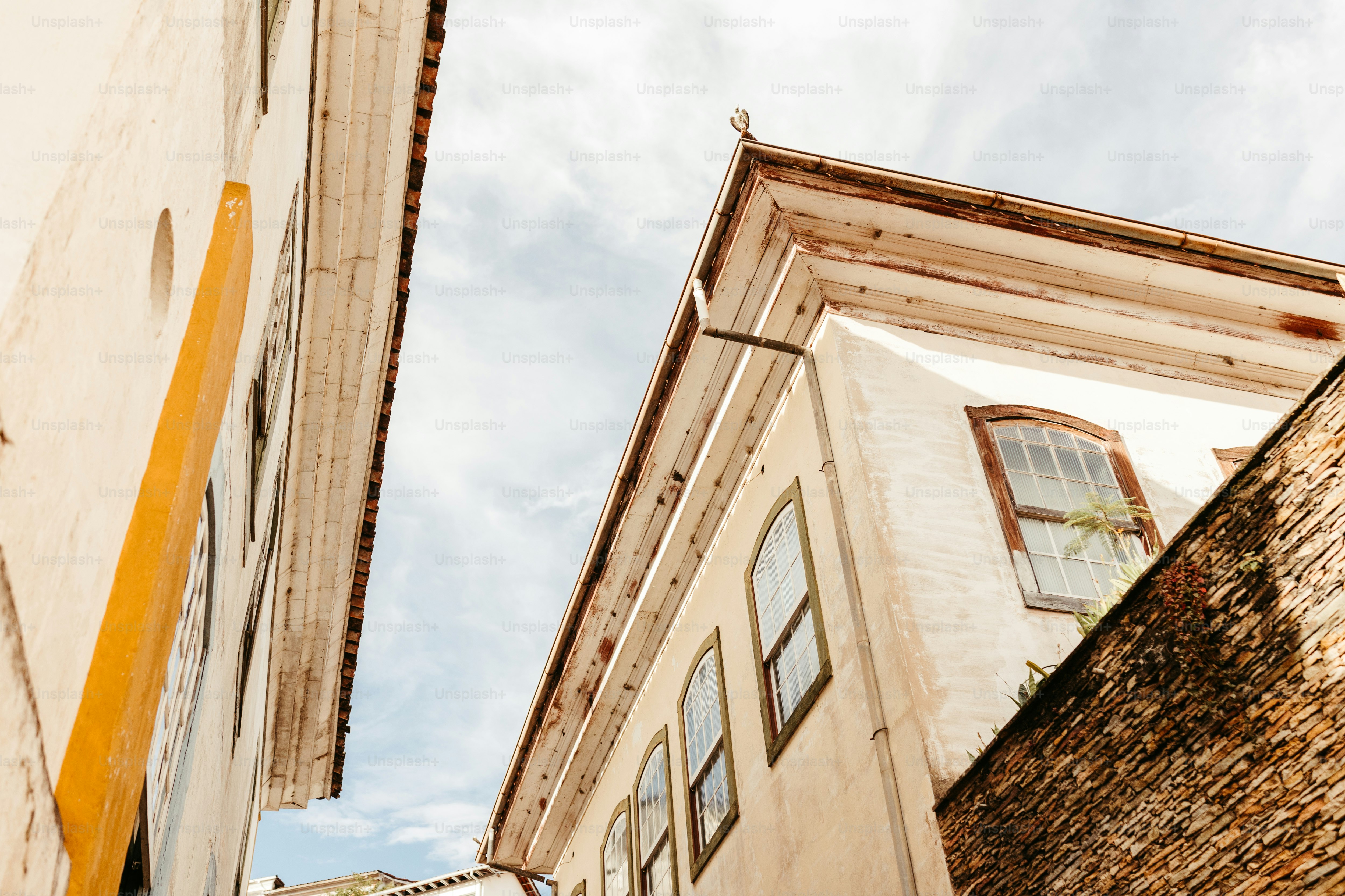 a tall building with a clock on the side of it