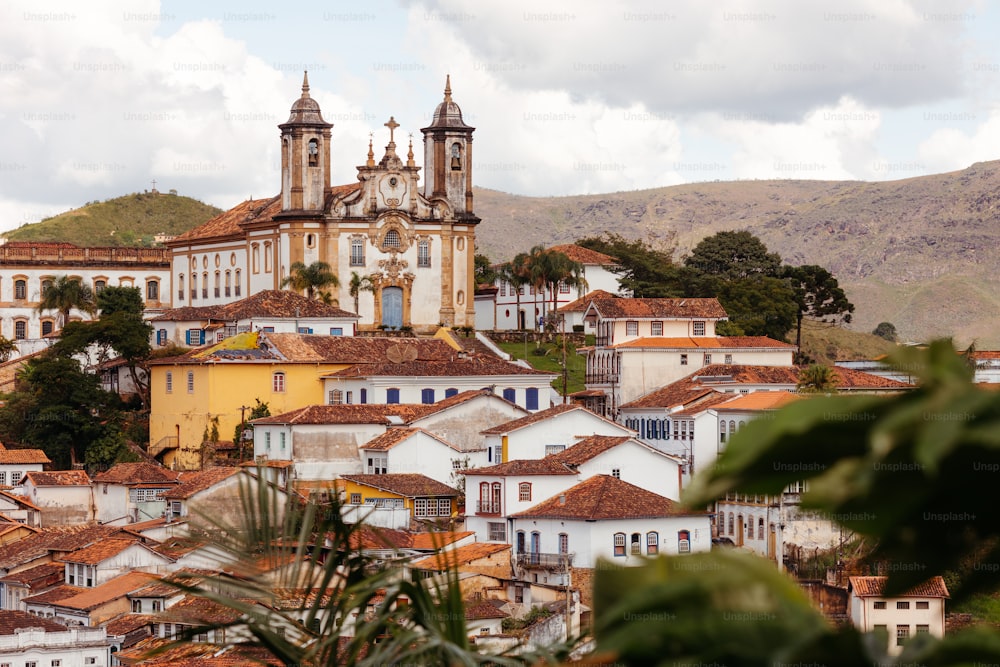 a view of a city with a church in the background