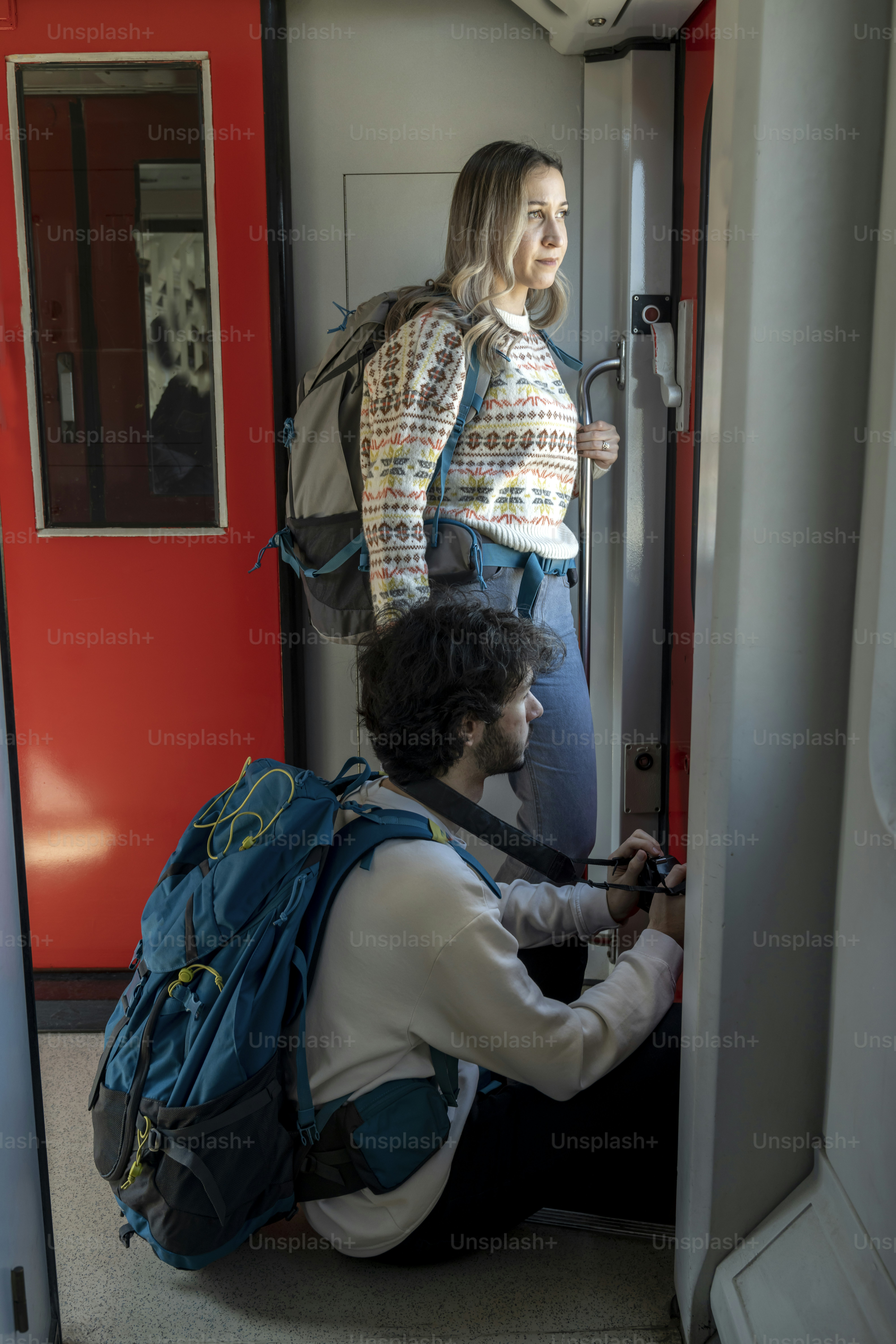 a man and a woman standing in a doorway